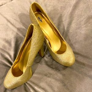 Gold platform heels